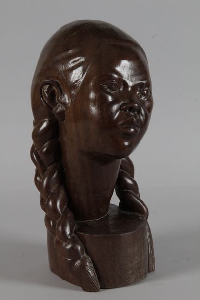 null In the taste of A. RANAIVOSON Head of young Malagasy woman, Carved wood Height...