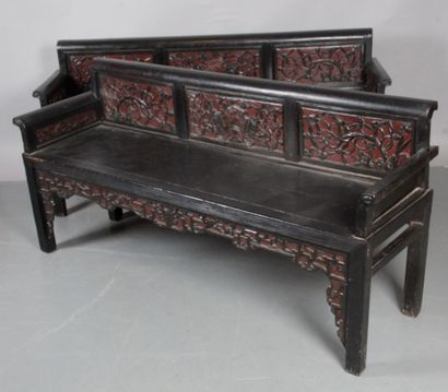 null CHINA, Pair of blackened wood benches with foliage scrolls on a red lacquer...