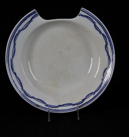 null PORCELAIN, TOURNAI. Plate, bearded dish, decorated in blue monochrome frieze...