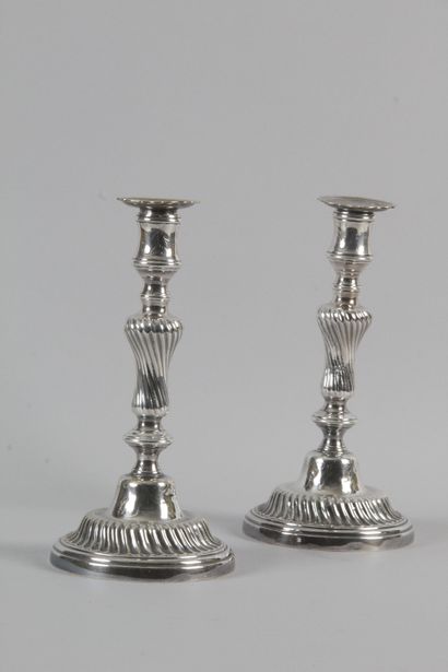null A PAIR OF silvered bronze baluster corkscrews decorated with twisted gadroons...