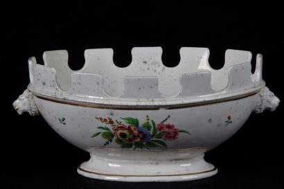 null A PORCELAIN TENDER REFRESHER, decorated with flowers and foliage, with a handle...