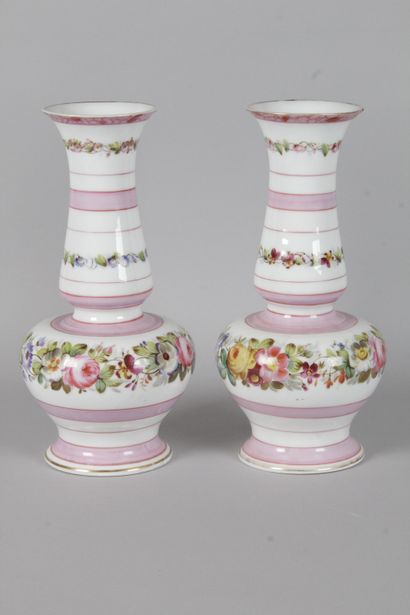 null Pair of vases with tapered bellies and slightly flared necks decorated with...