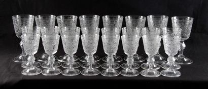 null ATTRIBUTED TO BACCARAT, part of a glass service, in crystal engraved with foliage,...