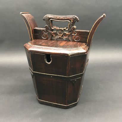  TEA BUCKET 
Carved wood, the handle showing a bat 
China end of 20th century beginning...