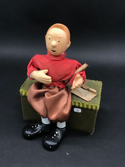 null Toy automaton with music of modern manufacture representing TINTIN on suitcase....