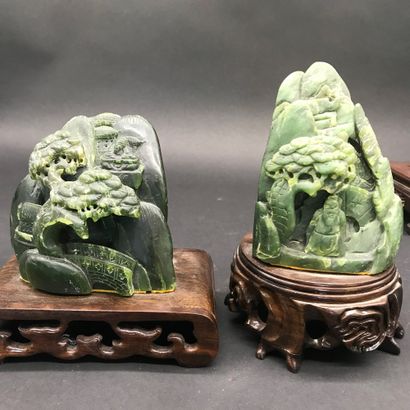 null CHINA 

Set of six hard stone subjects on a carved wooden base, one of which...