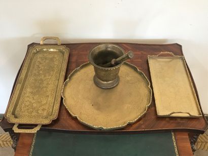 Three PLATES 
in chased copper decorated...
