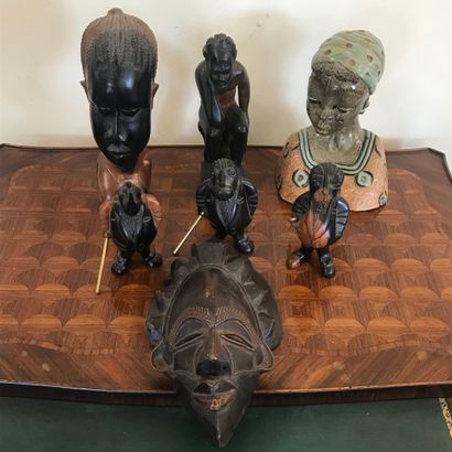  Lot of five statuette in carved wood, a gilded bronze representing two characters,...