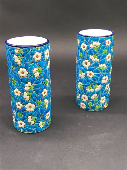 null Pair of VASES

in the Longwy taste in enamelled earthenware decorated with apple...