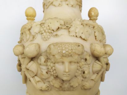 null Antique alabaster vase, carved in relief with bunches of grapes, water leaves,...