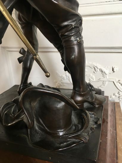 null Adrien GAUDEZ (1845-1902) La Leçon d’escrime Groupe en bronze à patine brune...