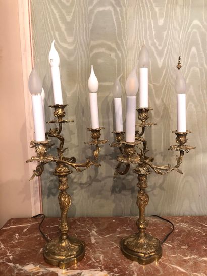 null A PAIR OF CANDELABRES mounted with electricity in gilt and chased bronze with...