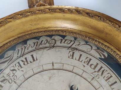 null Gilded and carved wood circular BAROMETER according to Toricelli, decorated...