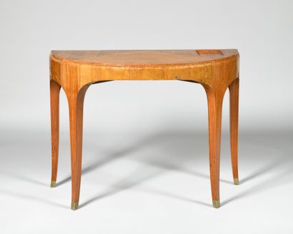 null WORK OF THE 1940's Half-moon console in sycamore veneer, the top with rectangular...