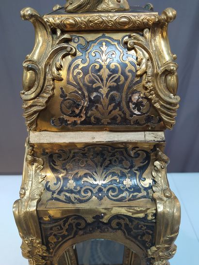 null CARTEL with Boulle marquetry of scales and brass, the top decorated with a child...