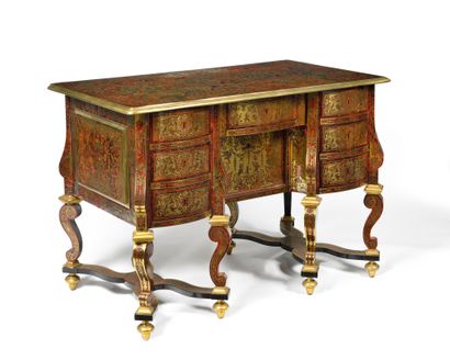 null A "mazarin" desk in red tinted tortoiseshell veneer and brass inlaid "in part"...