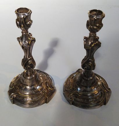 null PAIR OF FLAMPS in silvered bronze with rocaille decoration. Louis XV period....