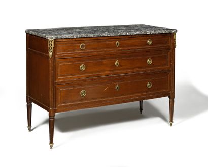 null A mahogany and mahogany veneer chest of drawers opening in front with three...