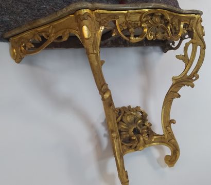 null CONSOLE in moulded and carved gilded wood with an openwork belt of foliage,...