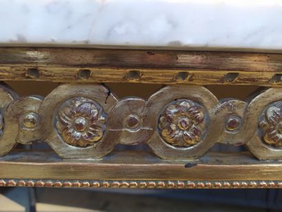 null Important CONSOLE in carved and gilded wood, decorated with rosettes and palmettes,...