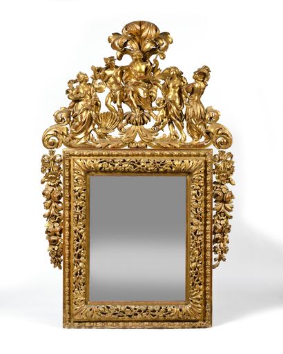 Large MIRROR in a gilded wooden frame, the...
