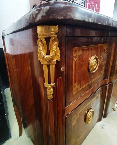 null A wood veneer and marquetry chest of drawers with two drawers in the front,...