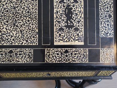 null 
A two parts ivory and bone marquetry and ebony chest of drawers with blackened...