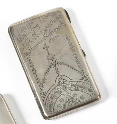 TWO CIGARETTE CASES 
Engraved silver 
Punches:...