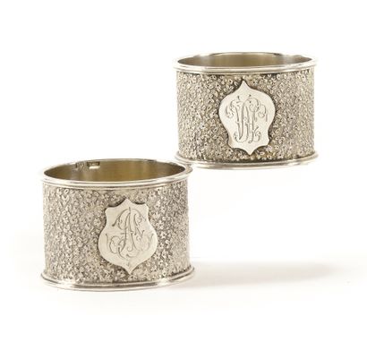 null Pair of napkin rings

One decorated with the number "NA

Engraved silver

hallmarks:...