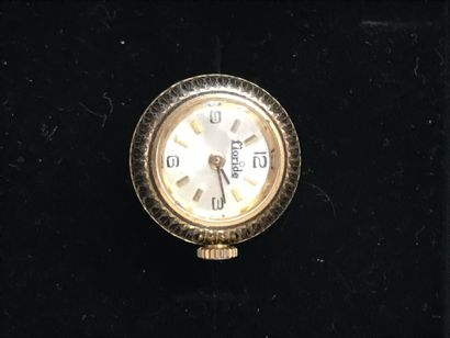 null FLORIDA

Pendant watch in gilded metal, Florida brand, in the shape of a guilloche...
