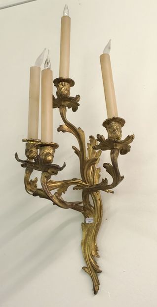 null Pair of gilt bronze and chased APLIQUES with four moving arms of light with...