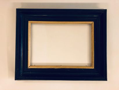 null Wooden frame and veneer of blackened pearwood with red highlights, Dutch style...