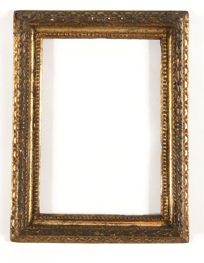 null SET OF THREE FRAMES in carved and gilded wood decorated with laurel leaves and...
