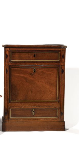 null A mahogany master's chest of drawers with two drawers and a flap on the front,...