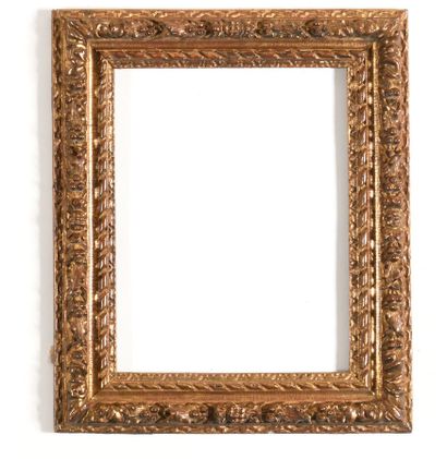 null SET OF THREE FRAMES in carved and gilded wood with foliage and grain decoration....