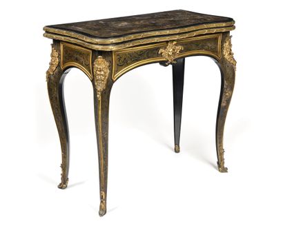 null A brown tortoiseshell, ebony and brass marquetry GAME TABLE decorated with foliage...