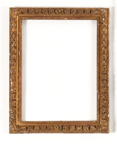 null SET OF THREE FRAMES in carved and gilded wood with foliage and grain decoration....