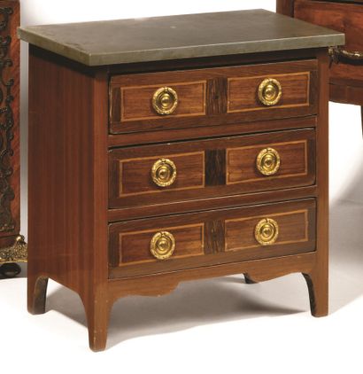 null A marquetry veneer chest of drawers with three drawers in the front, grey marble...