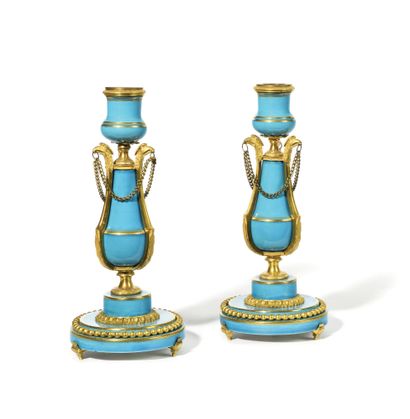 null Pair of porcelain and ormolu flamingos, the porcelain with celestial blue background,...