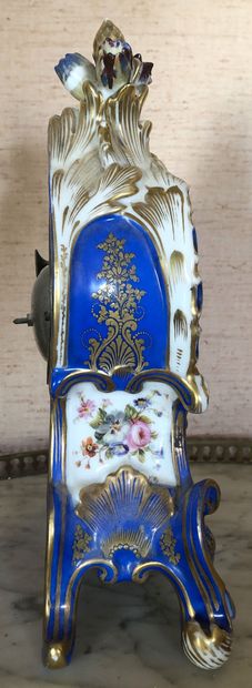 null A Parisian porcelain HANGER with bouquets of flowers on a blue and gold background....