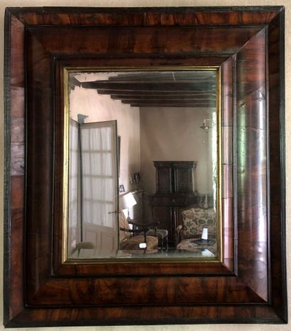 Rectangular walnut veneered mirror with ebony...