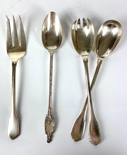 TWO SPoons and two serving spoons in silver....
