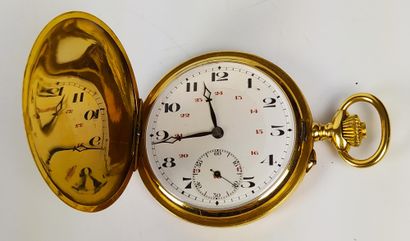 null MONTRE A GOUSSET en or jaune à fond émaillé blanc à chiffres arabes et chrono....