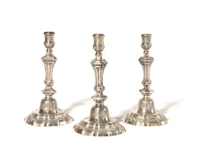 Suite of THREE silver FLAMPS with a poly-lobed...