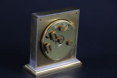 null HERMES CIRCA 1970. 8-day desk clock, steel and yellow gold plated, rectangular...