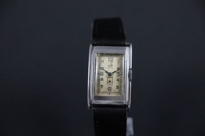 null LIP T18 STANDARD CIRCA 1950. Steel wristwatch, "tank" case, signed white dial,...