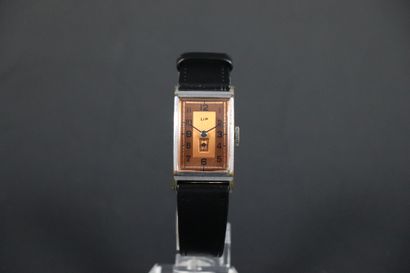 null LIP T18 CIRCA 1950. Ref: 8401XX. Steel wristwatch, "tank" case, signed copper...