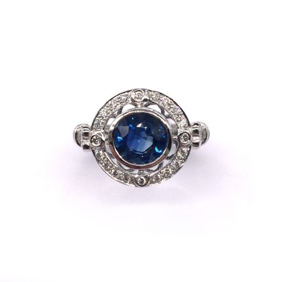 null RING in 18K white gold holding a sapphire of approximately 1.75 carat round...