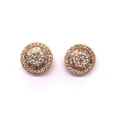 null PAIR OF EARRINGS in 18K pink gold composed of a central flower in a setting...