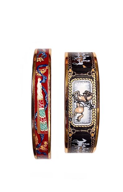 null HERMES BRACELETS in enamel, one decorated with trimmings, the second with chivalrous...